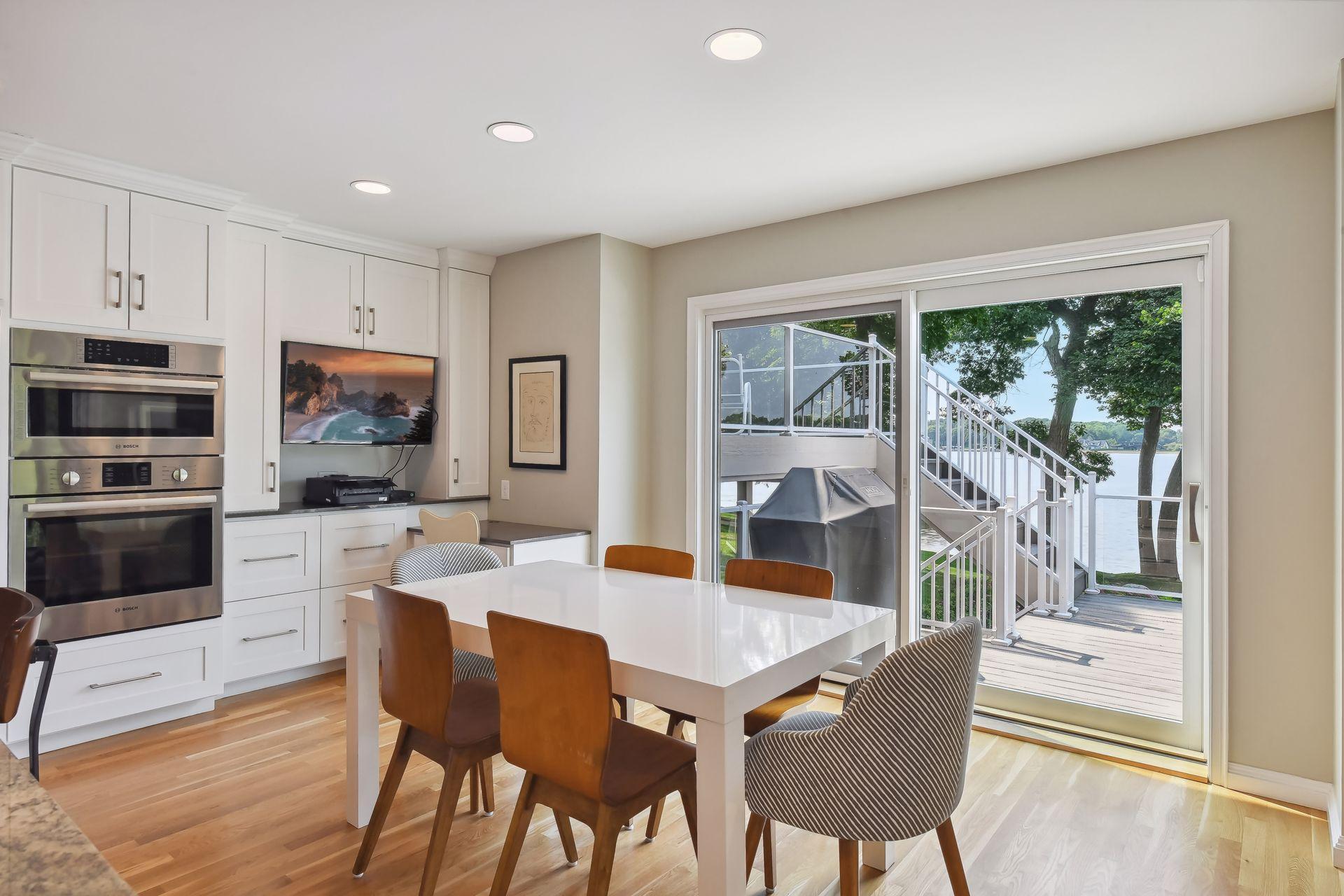 Walk out to more deck space with incredible lake views.