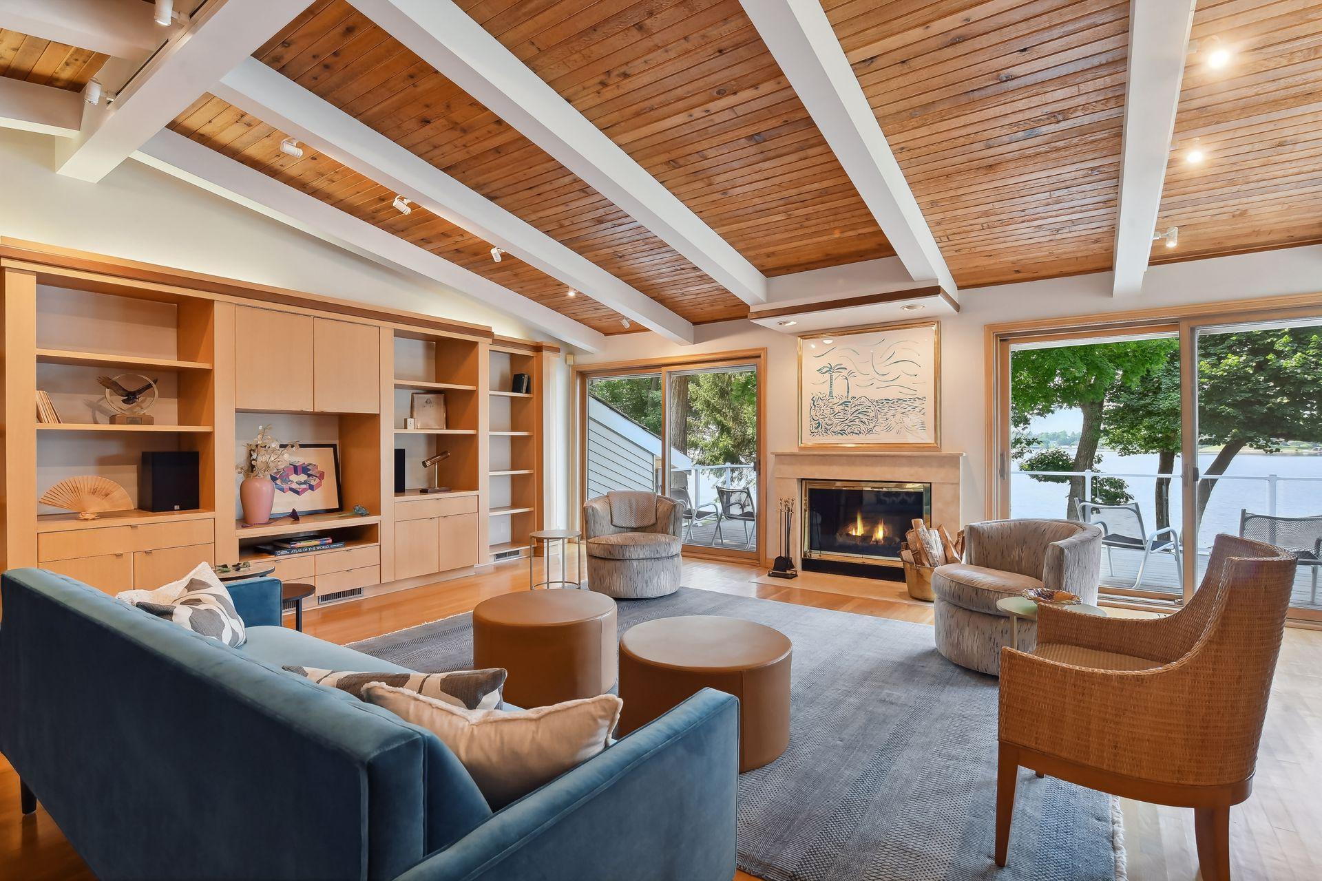 Enjoy gas fireplace and lake views simultaneously.