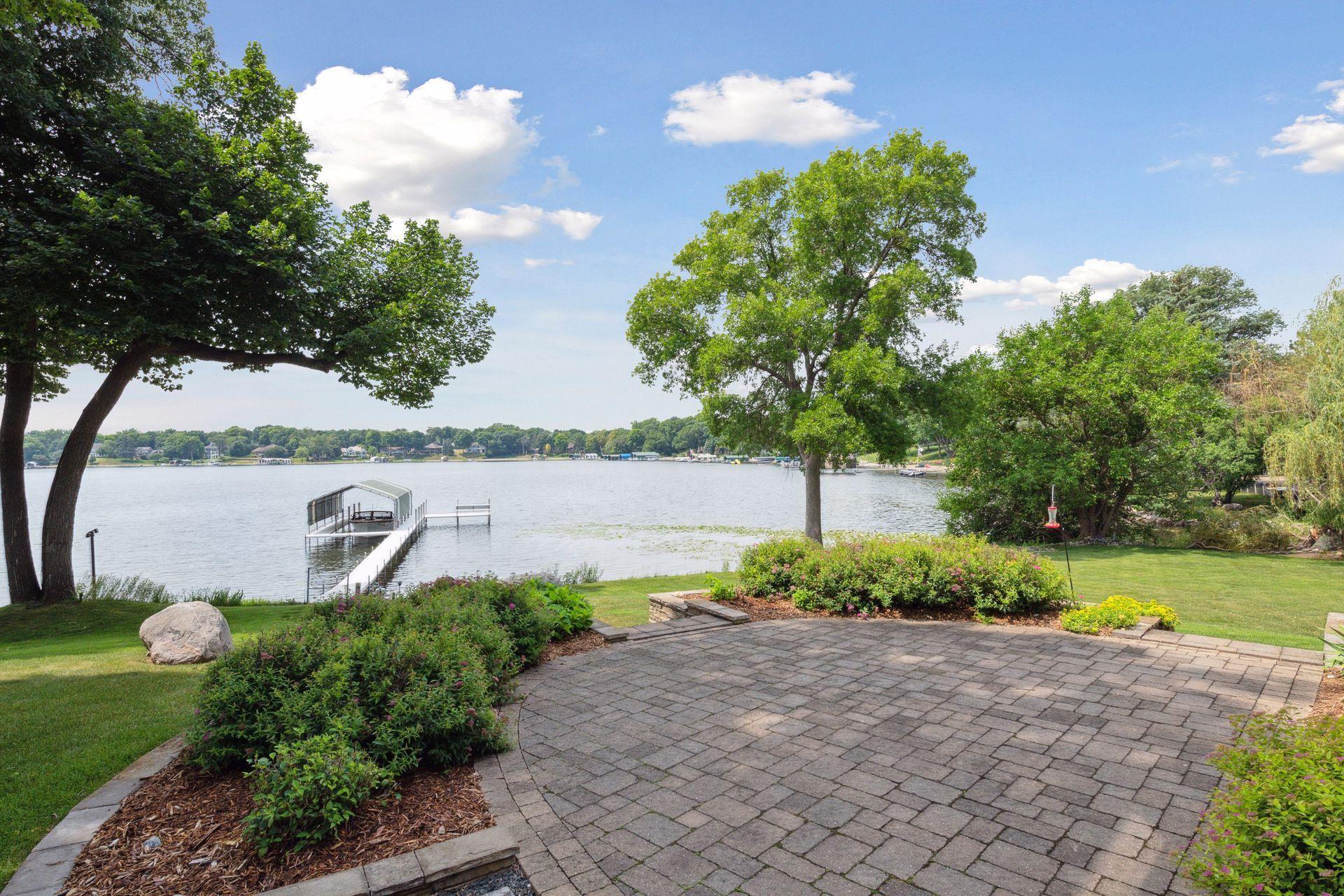 Pretty patio space with expansive lake views is great for outdoor dining.