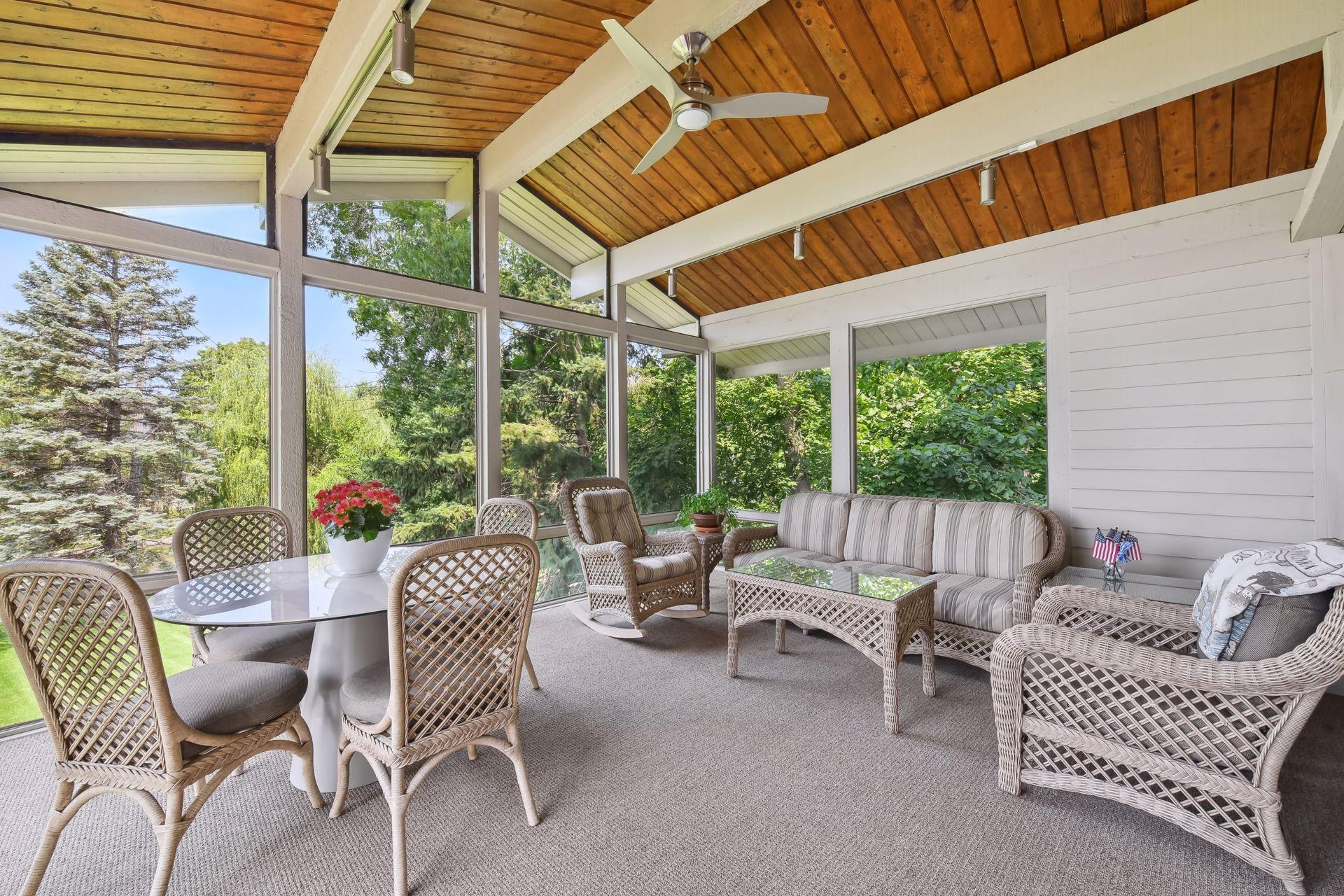 Screen porch is great for entertaining guests and enjoying lake views.