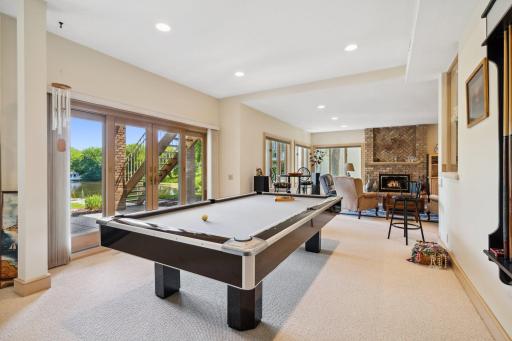Spacious game room and living spaces in lower level