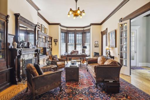 Photo for 495 Summit Avenue, Saint Paul, MN 55102 - Listing #6400517 The double tall windows frame the room, allowing for a serene atmosphere, perfect for quiet contemplation