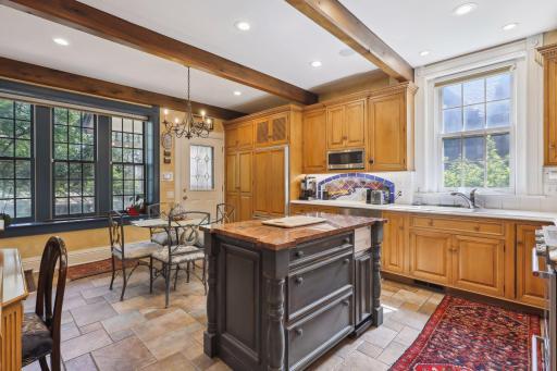 Photo for 495 Summit Avenue, Saint Paul, MN 55102 - Listing #6400517 Discover the dream eat-in kitchen with beautiful detailed cabinetry and tiled floors