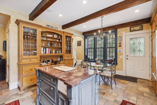 Photo for 495 Summit Avenue, Saint Paul, MN 55102 - Listing #6400517 Large windows fill the room with natural light and a convenient back door leads to the covered patio