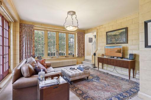 Photo for 495 Summit Avenue, Saint Paul, MN 55102 - Listing #6400517 A cozy, sun-drenched den connects the dining room and kitchen