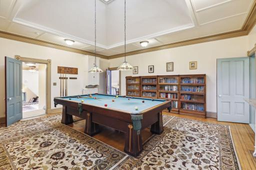 Photo for 495 Summit Avenue, Saint Paul, MN 55102 - Listing #6400517 Adjacent to it, a billiards room with a vaulted ceiling and built-in shelving invites friendly competition and entertainment