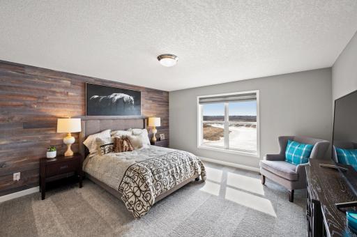 Find your retreat in this stunning owner’s suite. Enjoy the exclusivity of a private bath and huge walk-in closet. Photo of identical Lewis floorplan. Actual home finishes may vary.