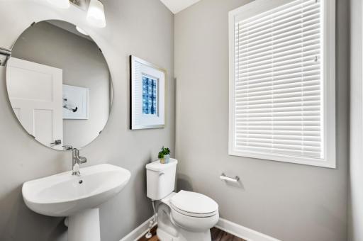 Main Level Powder Room. Photo of identical Lewis floorplan. Actual home finishes may vary.