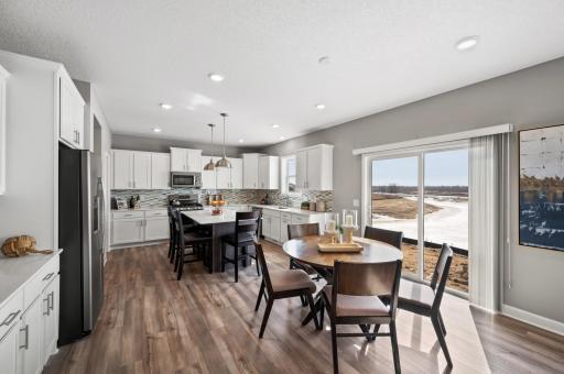 Thoughtfully-designed with a combination of functionality and modern design, this kitchen space is sure to impress. Photo of identical Lewis floorplan. Actual home finishes may vary.