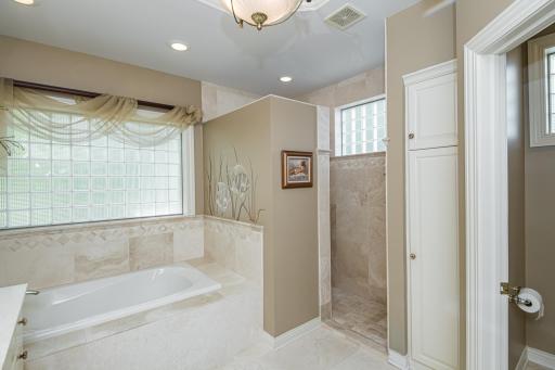 Heated Travertine floors and walk in shower/seperate tub