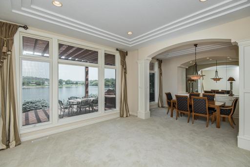 10 ft ceilings & oversized windows with lake views from living/dining areas