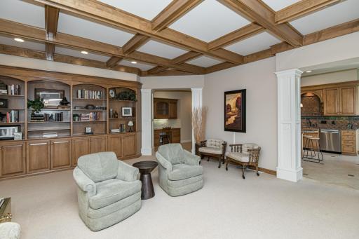 Coffered ceiling and wall of built in bookcases