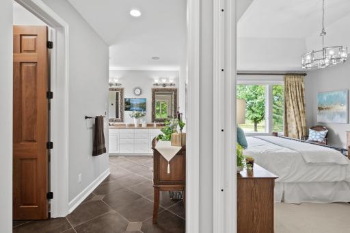 The primary bed and bath are a wonderful blend of luxury and comfort to bookend your day!