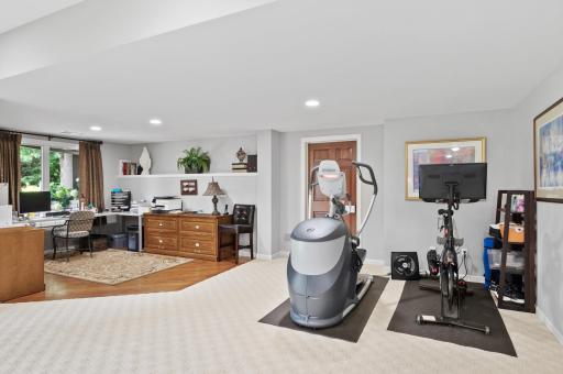 Off of the living room is an area that can be used for working out, a second office, game room, study area, sitting room, or anything else your heart desires.