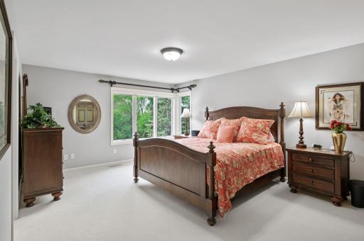 upper-level junior suite includes bathroom and large closet and natural light.
