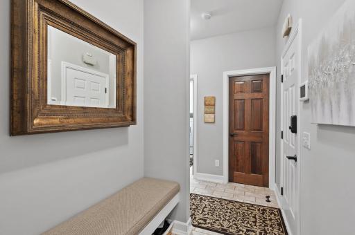 Your entryway from the garage has an oversized seating area and a walk-in coat closet, giving you plenty of space for everything.