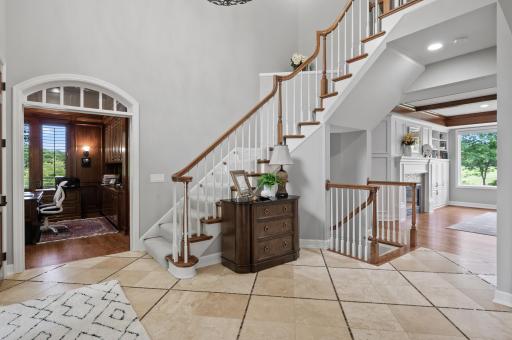 Entry way and staircase to 3 upstairs bedrooms.