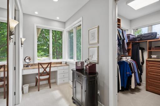 Primary bedroom features a make-up area and two walk-in closets, giving you everything you need and more.