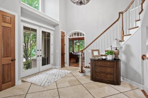 A welcoming entryway with your private office to your left and formal dining room to your right.