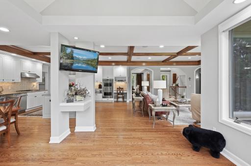 Sunroom view into the kitchen and family room
