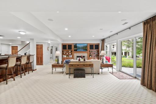 This lower-level space has ample room for entertaining and handing any gathering you may have.