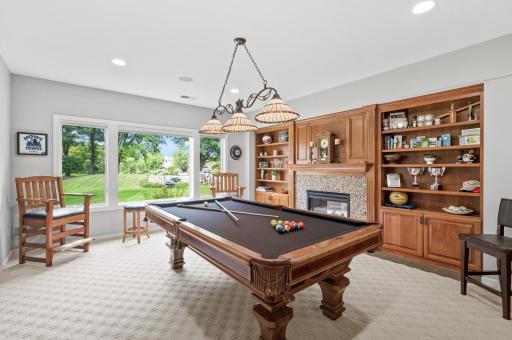 The billiards room has great views of the backyard waterfall.