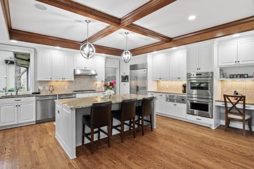 There is nothing missing in this kitchen. You have access to dual ovens, warming tray, large refrigerator, dual dish washers and a center island situated to make your social gatherings amazing.