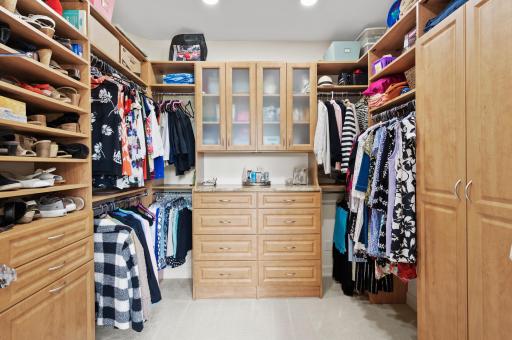 Second large walk-in closet with custom shelving.