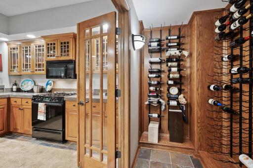 The French doors lead to your full kitchen.
