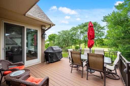 The main level deck provides you an outdoor oasis overlooking the 11th green. Greet your friends as they make par on their way to the 12th!!