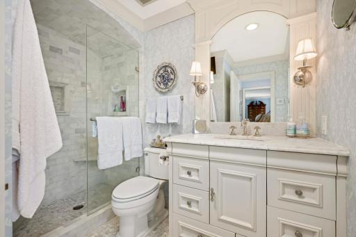 Remdeled primary bath with Carrera marble tile