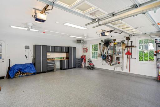 Newly finished oversized 2 car heated garage with epoxy floor