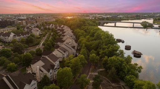 The rare combination of North Loop urban living and a tree-filled yard awaits you at 410 River Street.