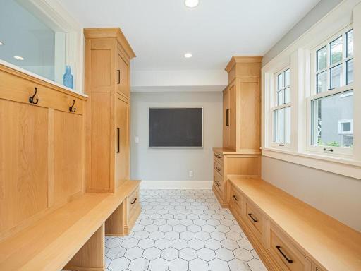 Recently added with the remodel. Desirable mudroom with custom built-ins and organizers.