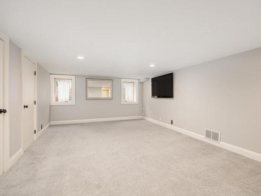 Bright lower level with egress windows, updated paint and newer carpet.