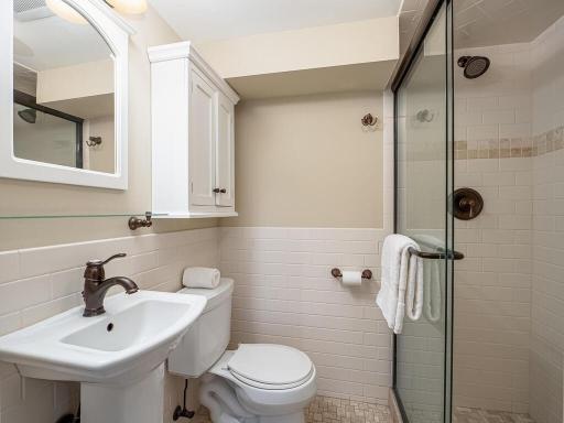 Lower level 3/4 bath located near sport court and sauna.