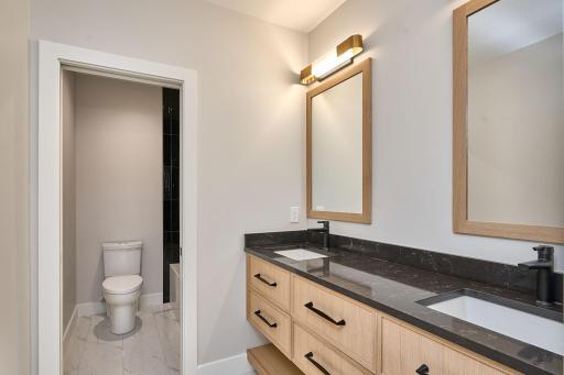 Lower level bathroom with high-end finishes