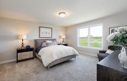 Find your retreat in this stunning owner's suite. Enjoy the exclusivity of a private bath and huge walk-in closet.