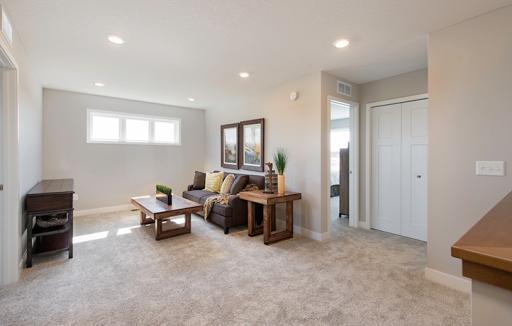 Located on the upper level, this perfectly sized loft has enough room for a desk, television and seating for all. Plus, it is just steps away from all bedrooms.