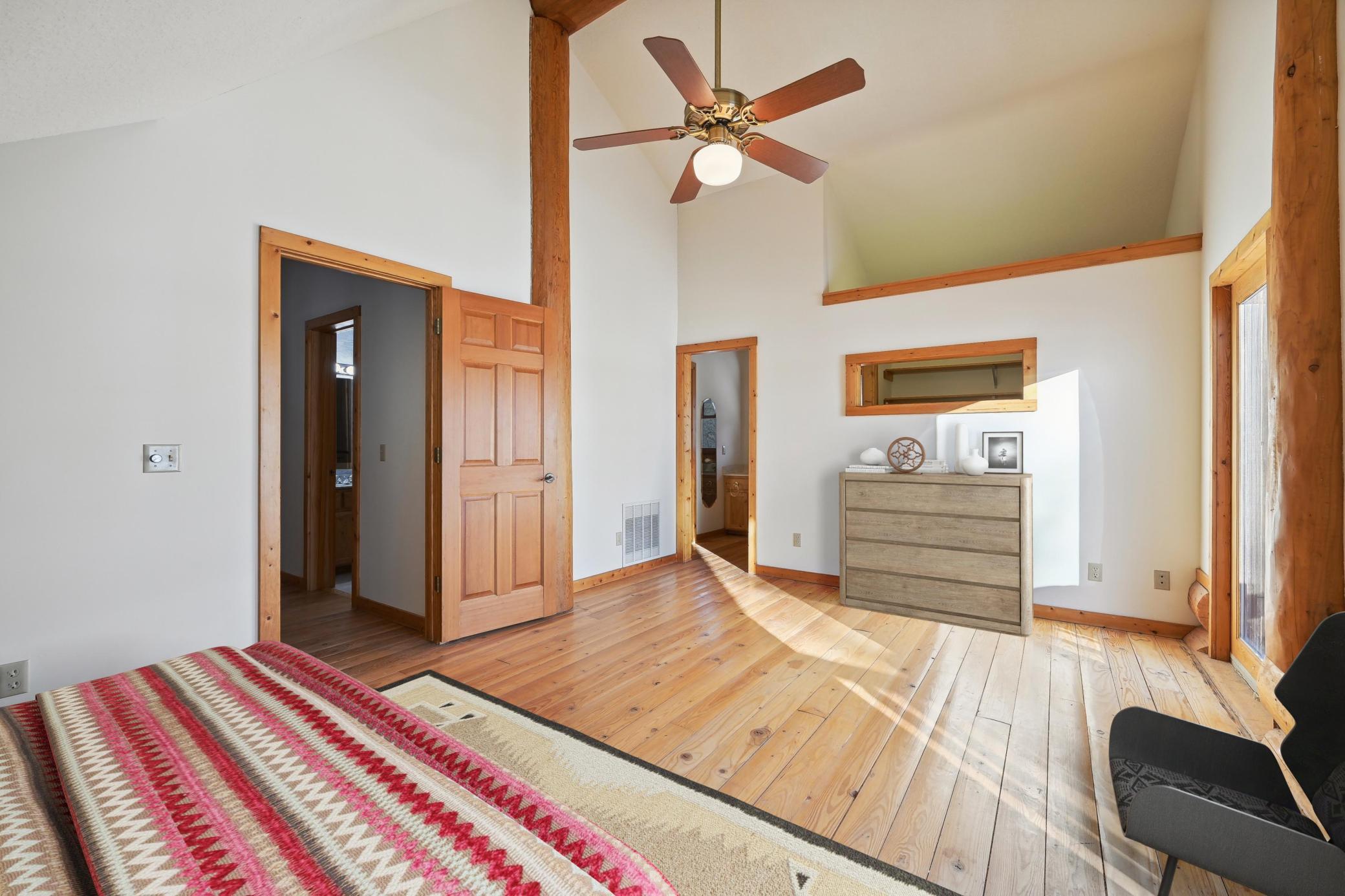 Upper Master bedroom with loft space *virtual stage