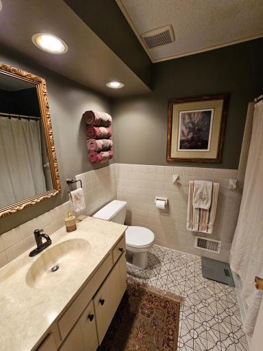 The main level features a full bathroom.