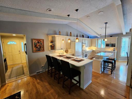 The lofted ceiling throughout the main level creates an air of spaciousness.