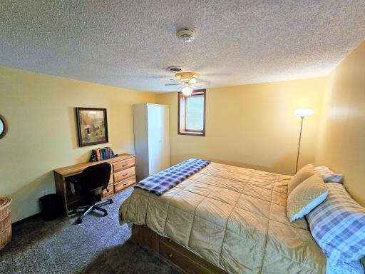 The lower level features two bedrooms each with egress access windows and storage.