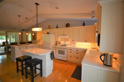 The kitchen is a chef's dream, with high-end appliances, granite countertops, and plenty of storage space.