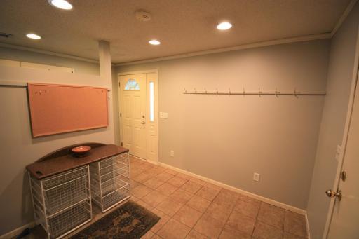There is a handy mudroom area off the side entry and garage entry to contain all your seasonal gear.