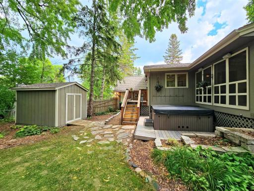 The pathway continues from the spa area and leads out to the gardens and nearly a half acre.