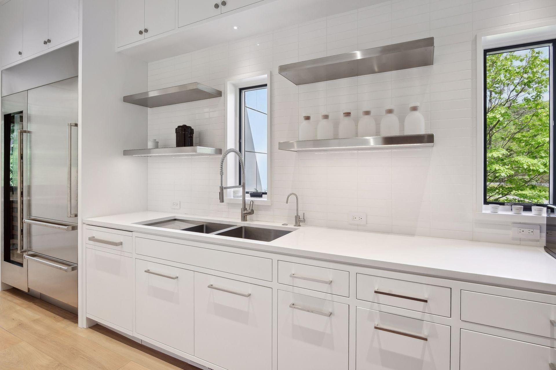 Pantry includes wine fridge, ovens and prep space