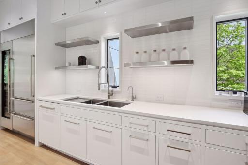 Pantry includes wine fridge, ovens and prep space