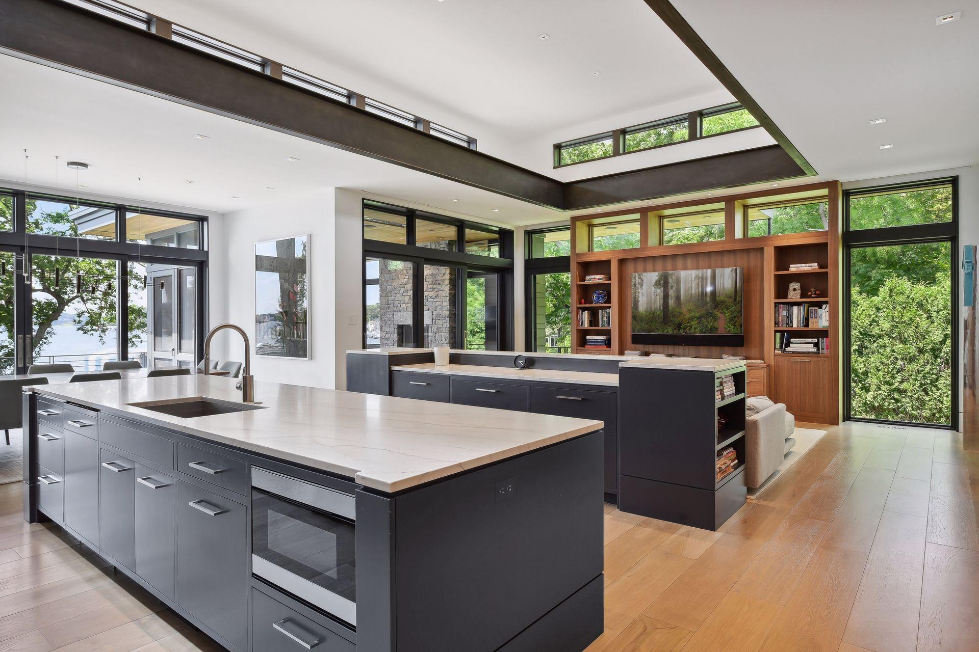 Kitchen area opens to casual living spaces