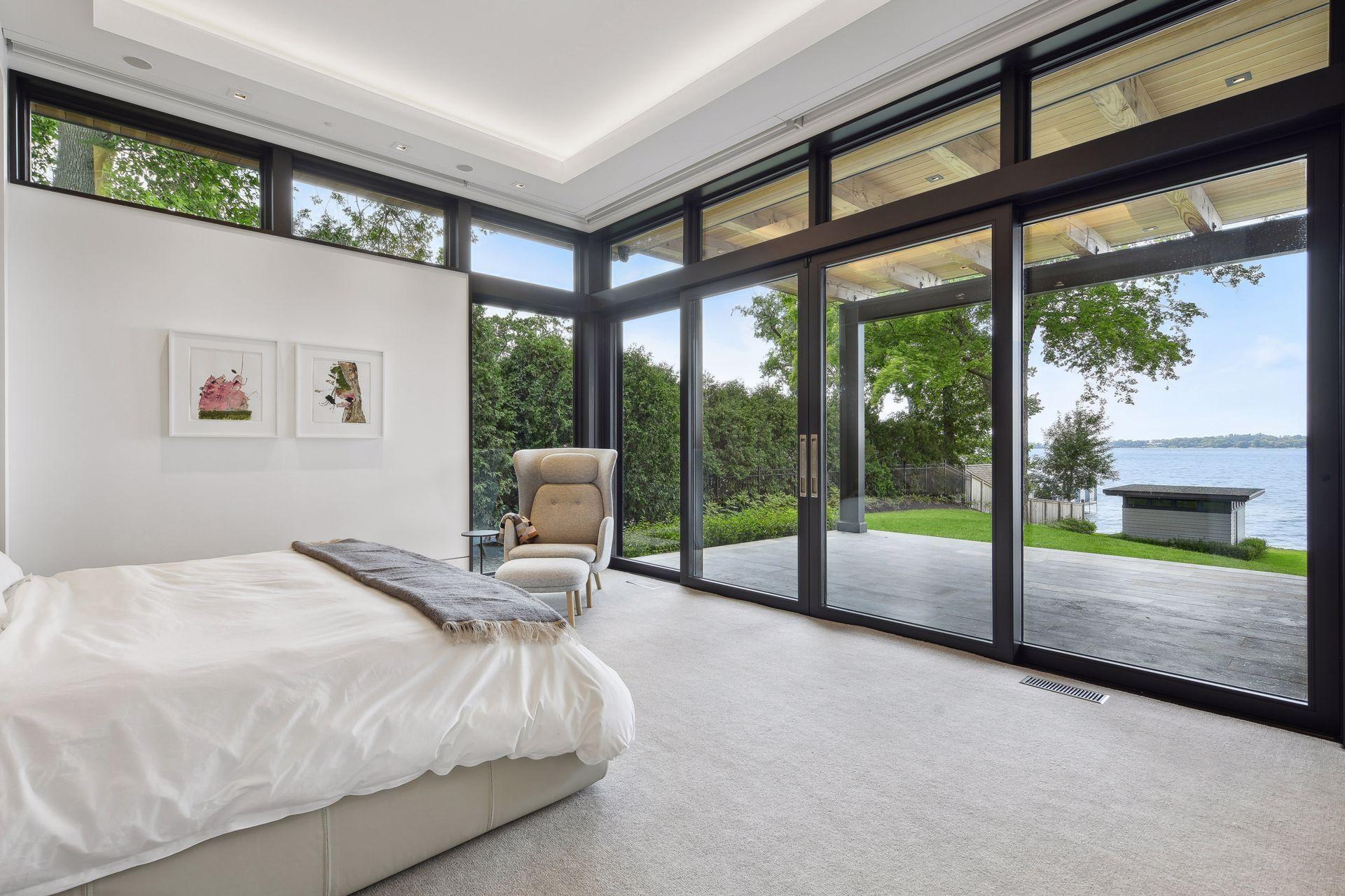 Primary bedroom with doors to terrace